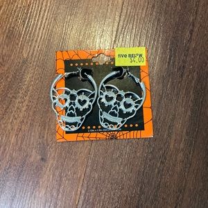 Brand new skeleton heart eyes earrings